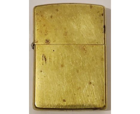 A Zippo lighter: 60th anniversary model gold coloured 1932-1992.