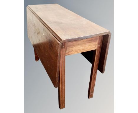 A 19th century flap sided gate leg table 