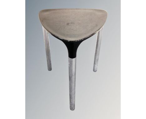 A Gedy Yannis tripod stool on chrome legs.