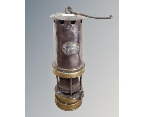 A 19th century steel and brass miner's lamp 