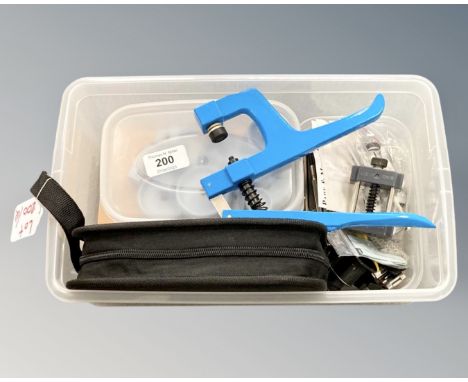 A collection of horologist's tools :  Clamps, precision screwdrivers, eye loop, etc.  (Q)  