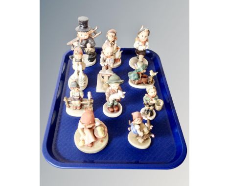 A tray of eleven Hummel figures 