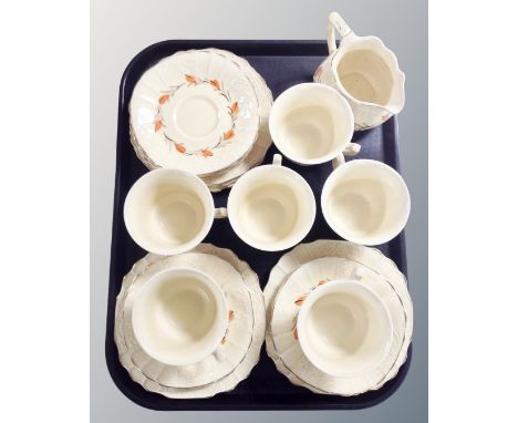 A nineteen piece hand painted tea service 