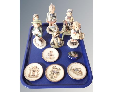 A tray of six Hummel figures, four dishes together with a metal pill box 