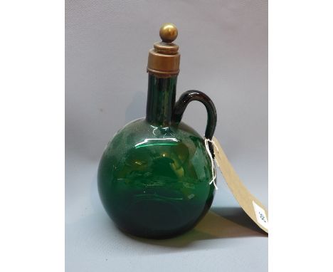 An antique style green glass decanter, H. 23cm