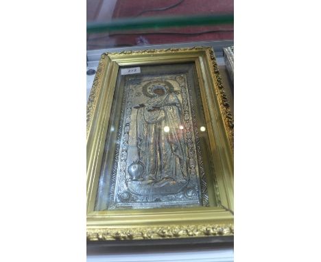 A 20th Century Romanian icon, the oklad over a panel, within a glazed frame, H:33cm
