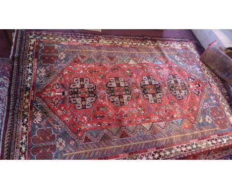 An extremely fine South West Persian Qashqai carpet, a chain pole medallion with repeating animal motifs on a teracotta field