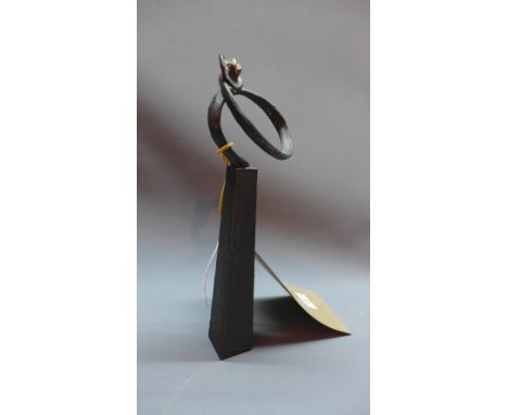 A bronze abstract study of a hat on a spiral, raised on tapered base, H. 19cm