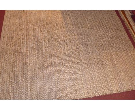 A hand knotted Sumak carpet on a grey ground. 231x160cm