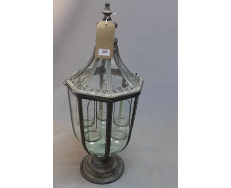 A Venetian style storm lantern.