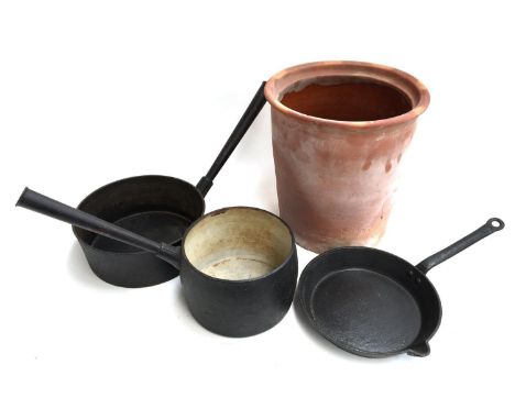 A stoneware flower pot, an Esse cast iron skillet, a 'No.7 Falkirk, 4 Qts' enamel and cast iron pot and one other, and an alu