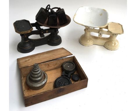 A set of Marsdens kitchen scales with assorted weights, together with one other with weights 