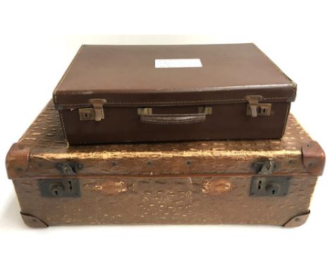 Two compressed fibre vintage suitcases 
