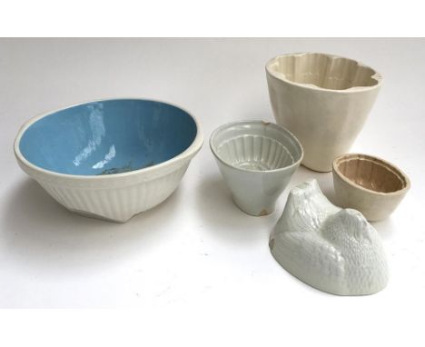 Several ceramic terrine molds and a mixing bowl 