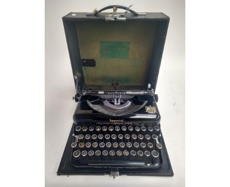 An Imperial 'Good Companion Model T' typewriter, with key 