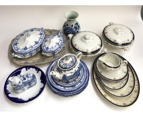 A mixed lot of blue and white ceramics to include a Palissay teapot, several tureens, plates and meat plates 