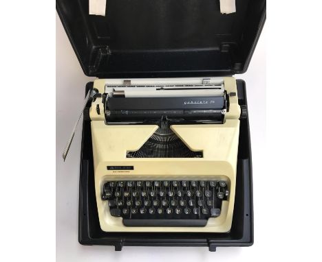 An Adler Gabrielle 25 portable typewriter, in case 