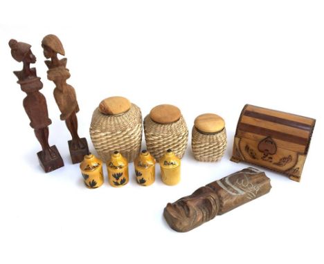 A mixed lot to include two wooden stylised carved figurines of ladies, three glass jars encased in rush, four french ceramic 