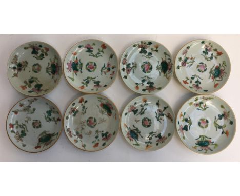 A set of eight 19th century Oriental saucers 