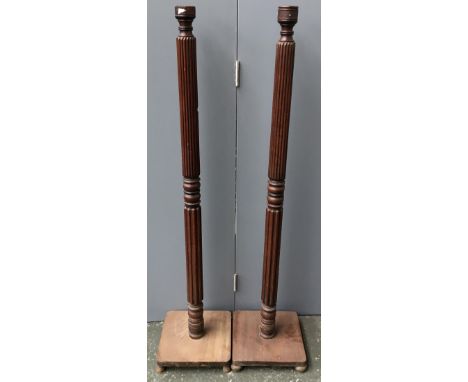 A pair of early 20th century reeded lamp stands on square bases, each 125cmH 