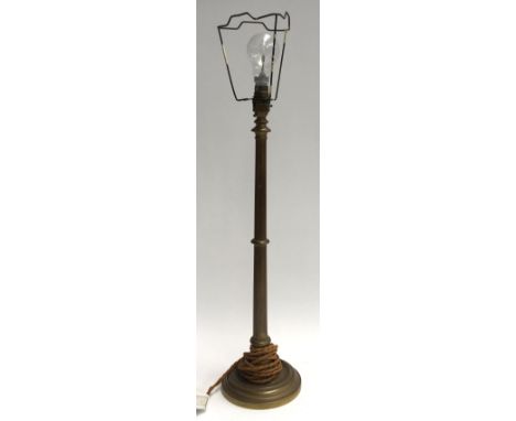 A trench art (?) brass table lamp, 56cmH 