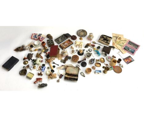 A mixed lot of interesting things to include scent bottles, coins, figurines, shells, trinket boxes, silver pin dish, two min