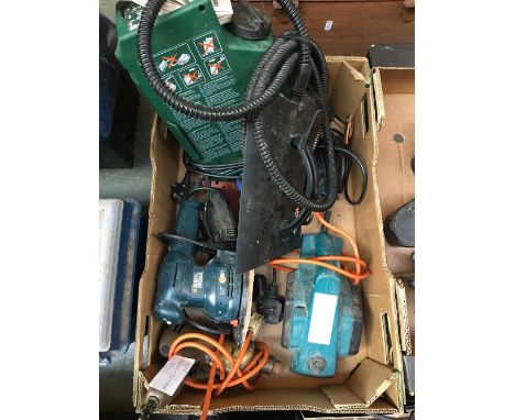 A box of tools to include a Black and Decker sander, electric planer, drill, and other tools 