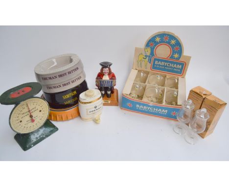 A mixed lot of pub related items to include a quantity of ceramic ashtrays, two boxed Glenmorangie tasting glasses, a Charrin
