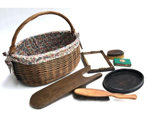A mixed lot to include boot jack, clothes brush, oval trinket dish, match strike, looking glass with ropetwist frame, all in 