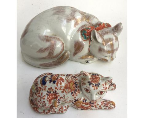 An imari style cat, six marks to base; together with a larger sleeping ceramic cat 