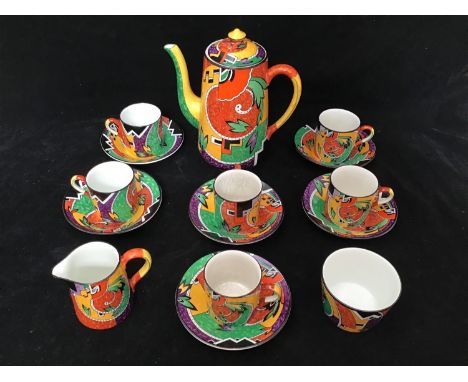 An art deco Grimwades Royal Winton 'Jazz' pattern coffee set comprising six coffee cans and saucers, coffee pot, milk and sug