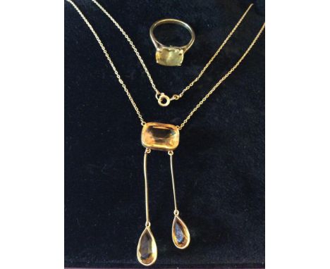 A 9ct gold fine pendant necklace hung with one rectangular and two pear-shaped citrine, together with an unmarked gold and ci