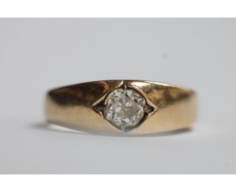 A yellow metal (tests as 18ct gold) ring, the top centrally set with a Victorian cut solitaire diamond, estimated diamond wei