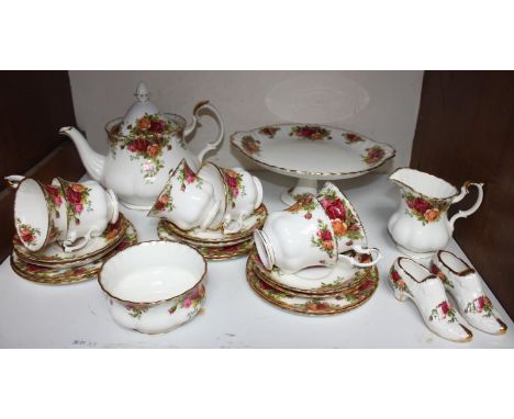 SECTION 1.  A Royal Albert 'Old Country Roses'  tea-set comprising six-each teacups, saucers and sandwich plates, teapot, san