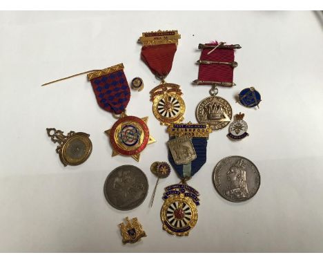 Of Masonic interest, a small collection of assorted gilt-metal and enamel jewels for the National Association of Round Tables