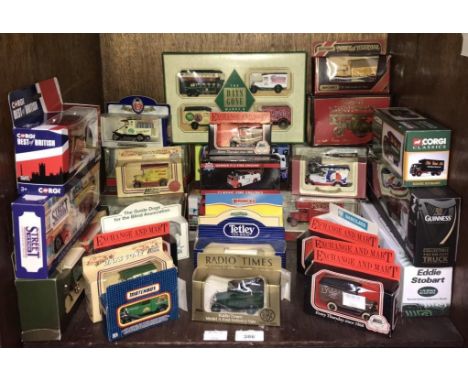 A collection of approximately 34 boxed die-cast model cars including Matchbox 'Models of Yesteryear', Exchange and Mart, Corg