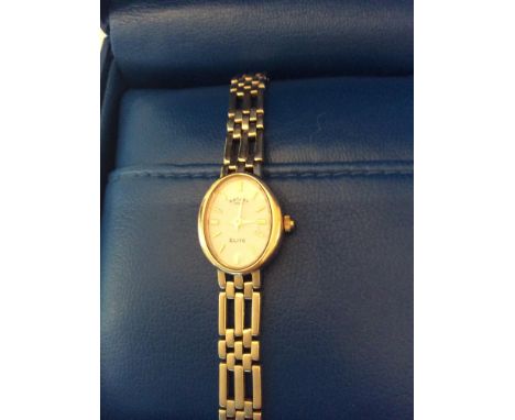 A ladies 9ct gold Rotary wristwatch, oval white enamel dial, quartz movement and 9ct gold gate-bracelet strap, 18.6g (bracele