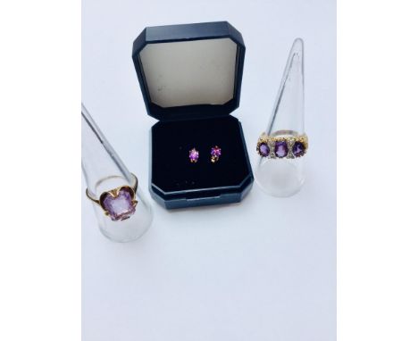 An assorted lot of Amethyst jewellery, consisting of 2 9ct gold rings and a pair of small 9ct gold studs.  Single stone ameth