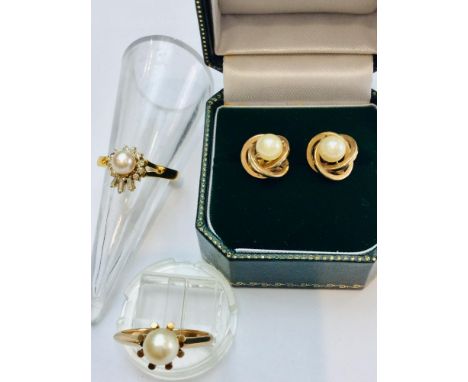 An assorted lot consisting of a 9ct gold pearl ring, weighing 2.5 grams, Finger size N. Together with a pair of 9ct gold pear