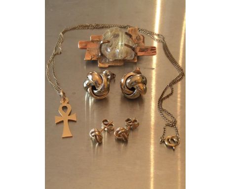 A 9ct gold fine necklace with Ankh Cross pendant, together with two various pairs of Celtic knot stud earrings, and a 9ct gol