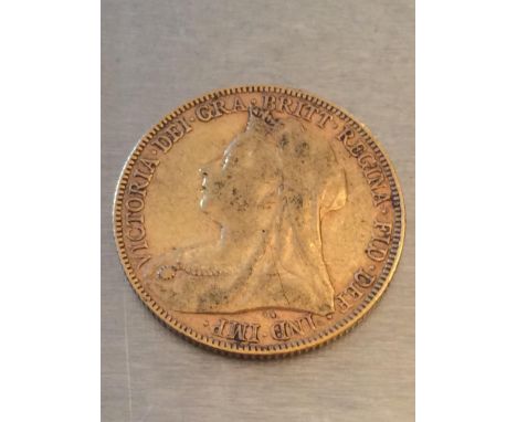 An 1872 Queen Victoria Gold Sovereign, F+ 