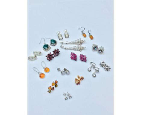 A selection of silver earrings, consisting of 15 x pairs set with various stones, including Garnet, Ruby, Amber and Cubic zir