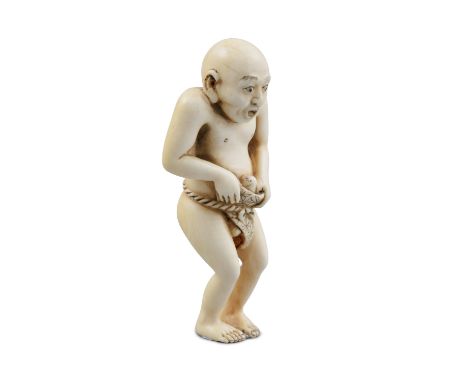 *KOJITSU光實: AN IVORY 'NAKED MAN' KATABORI NETSUKE Japan, 19th century Pierced with two himotochi. With signature reading Koji