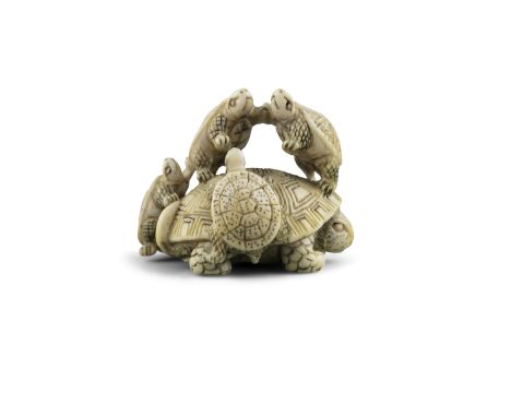 *GYOKUSEKI 玉石: AN IVORY 'FIVE TURTLES' KATABORI NETSUKE Japan, 19th century Pierced with two himotoshi. With a signature to t