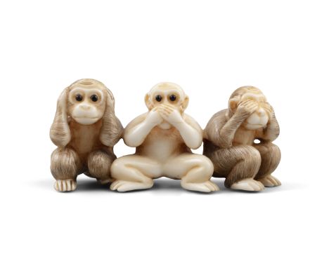 *SHOZAN / MATSUYAMA 松山: AN IVORY 'THREE WISE MONKEYS' KATABORI NETSUKE Japan, 19th century Pierced with two himotoshi. With s