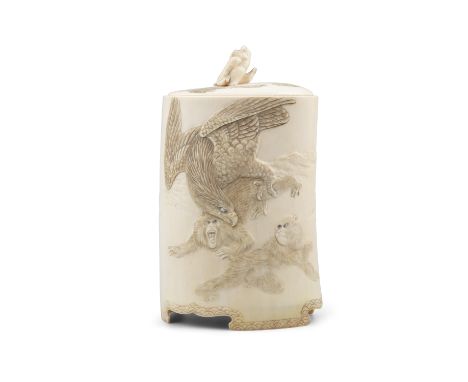 *AN IVORY 'MONKEYS AND EAGLE' BOX AND COVER Japan, Meiji period The outer is adorned in low-relief with monkeys fighting with