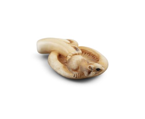 *KOSEN / KOIZUMI 古泉: A STAG ANTLER 'RAT AND MUSHROOM' KATABORI NETSUKE Japan, 19th century Pierced with two himotoshi. With s