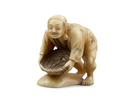 *GYOKUSEN TOMOCHIKA 友近: AN IVORY 'PEASANT WITH BASKET' KATABORI NETSUKE Japan, Kyoto, 19th century Pierced with two himotochi