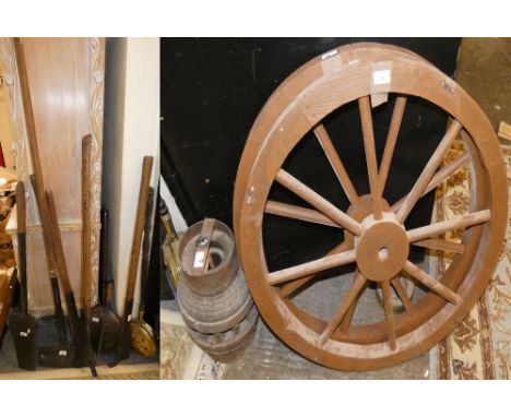 A pair of cart wheels, vintage garden tools, warming pans, etc.