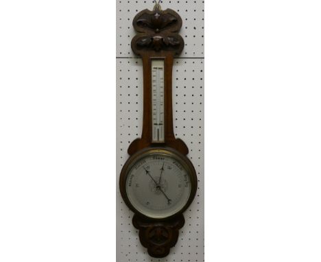 An aneroid oak cased wall hanging barometer, 74 cm long